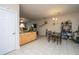 The dining area sits next to the kitchen; it features a small table and abuts the living room at 219 Tuscany Ct, Ladson, SC 29456