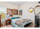 Charming bedroom with a twin bed, decorative throw, and warm lighting from a bedside lamp at 226 Clydesdale Cir, Summerville, SC 29486