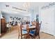 Open dining area features stylish chandelier and seamless access to a spacious living room at 226 Clydesdale Cir, Summerville, SC 29486