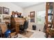 Cozy office with vintage rolltop desk, comfortable chair, and natural light from the window at 226 Clydesdale Cir, Summerville, SC 29486