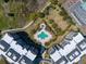 Aerial view of the community pool area highlighting the buildings and its landscaping at 233 S Plaza Ct # 210, Mount Pleasant, SC 29464