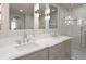 Modern bathroom featuring double sinks, stylish fixtures, and a luxurious walk-in shower at 233 S Plaza Ct # 210, Mount Pleasant, SC 29464