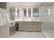 Bright bathroom with double sink vanity, white countertops, and sleek, modern fixtures at 233 S Plaza Ct # 210, Mount Pleasant, SC 29464
