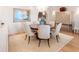 Elegant dining area with wood floors, chandelier, and stylish décor at 233 S Plaza Ct # 210, Mount Pleasant, SC 29464