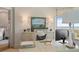Bright home office featuring a large bay window with scenic views and stylish decor at 233 S Plaza Ct # 210, Mount Pleasant, SC 29464