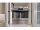 Kitchen includes a stainless steel coffee maker built into custom cabinets at 233 S Plaza Ct # 210, Mount Pleasant, SC 29464