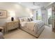 Bedroom with large bed, a nightstand, and a view to the outside, next to a hallway and an adjoining room at 233 S Plaza Ct # 210, Mount Pleasant, SC 29464