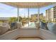 A bright and scenic window seat featuring picturesque neighborhood views at 233 S Plaza Ct # 210, Mount Pleasant, SC 29464