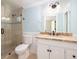 Bathroom features a glass enclosed shower, vanity with marble countertop, and modern fixtures at 24 Waterway Island Dr, Isle of Palms, SC 29451