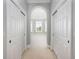Hallway view with archway leads to bedroom with a bay window for lots of natural light at 24 Waterway Island Dr, Isle of Palms, SC 29451