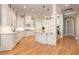 Spacious kitchen with custom cabinets, granite countertops, and stainless steel appliances at 24 Waterway Island Dr, Isle of Palms, SC 29451