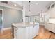 Modern kitchen island with granite countertops and stainless steel appliances at 24 Waterway Island Dr, Isle of Palms, SC 29451
