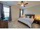 Comfortable bedroom with large windows, ceiling fan, and tasteful furnishings at 251 Summers Dr, Summerville, SC 29485