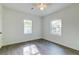 Bright bedroom with luxury vinyl plank flooring, natural light and a ceiling fan for added comfort at 2604 Ferrara Dr, North Charleston, SC 29405