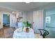 Charming kitchen with white appliances and a cozy breakfast nook that is perfect for casual dining at 2604 Ferrara Dr, North Charleston, SC 29405