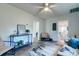 Bright living room featuring hardwood floors, fresh paint, ceiling fan, and stylish decor at 2604 Ferrara Dr, North Charleston, SC 29405