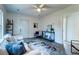 Bright living room featuring hardwood floors, fresh paint, and stylish decor at 2604 Ferrara Dr, North Charleston, SC 29405