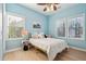 Bright bedroom with a bed, a nightstand, and multiple windows that provide lots of natural light at 307 Shoals Dr, Mount Pleasant, SC 29464