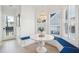 Charming breakfast nook with built-in seating, a round table, and ample natural light from large windows at 307 Shoals Dr, Mount Pleasant, SC 29464