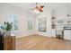 Well-lit office space with hardwood floors, built-in shelves, and a comfortable work area at 307 Shoals Dr, Mount Pleasant, SC 29464