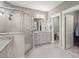 Bright bathroom features a glass enclosed shower, granite vanity and access to water closet and large walk-in closet at 311 Weston Hall Dr, Summerville, SC 29483