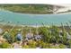Breathtaking aerial view featuring stunning waterfront homes with private boat docks and lush surroundings at 3121 Marshgate Dr, Johns Island, SC 29455