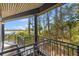 Private balcony featuring black wrought iron railings and amazing views of the trees and surrounding waterways at 3121 Marshgate Dr, Johns Island, SC 29455