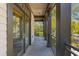 Expansive outdoor balcony featuring dark posts and railing and views of the neighborhood at 3121 Marshgate Dr, Johns Island, SC 29455