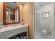 Bright bathroom featuring a vanity with lots of counter space and an adjacent shower and toilet area at 3121 Marshgate Dr, Johns Island, SC 29455