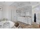 Bright bathroom featuring a soaking tub, double vanity, and neutral decor for a spa-like retreat at 3121 Marshgate Dr, Johns Island, SC 29455