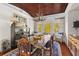 Elegant dining room featuring a unique antler chandelier and ample natural light from the large windows at 3121 Marshgate Dr, Johns Island, SC 29455