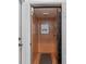 This residential elevator with oak paneling offers convenient accessibility throughout the home at 3121 Marshgate Dr, Johns Island, SC 29455