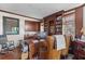 Comfortable office space with custom built-ins, offering a stylish and organized workspace at 3121 Marshgate Dr, Johns Island, SC 29455