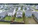 Aerial view of a backyard with a lawn, screen porch, patio set, and wooden fence at 315 Black Birch Dr, Summerville, SC 29486