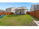 Large backyard with a screened-in porch and lawn at 315 Black Birch Dr, Summerville, SC 29486