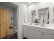 Bathroom features a double sink vanity and shower/tub with yellow curtain at 315 Black Birch Dr, Summerville, SC 29486