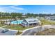 Community clubhouse with an outdoor kitchen, splash pad, and swimming pool area at 315 Black Birch Dr, Summerville, SC 29486