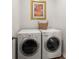 Convenient laundry room with a side-by-side washer and dryer with picture at 315 Black Birch Dr, Summerville, SC 29486