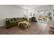 Cozy living room featuring hardwood floors, fireplace, and outdoor access at 315 Black Birch Dr, Summerville, SC 29486