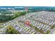 Aerial view of an entire neighborhood highlighting amenities like the swimming pool and lakes at 315 Black Birch Dr, Summerville, SC 29486