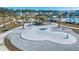 Aerial view of a community splash pad, picnic tables, and seating areas at 315 Black Birch Dr, Summerville, SC 29486