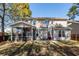 Exterior rear view showcasing the patio, screened porch and spacious yard at 327 Freeland Way, Moncks Corner, SC 29461