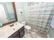 Bathroom featuring a modern vanity, decorative mirror, and neutral decor at 327 Freeland Way, Moncks Corner, SC 29461