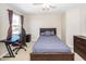 Bedroom featuring a bed, a desk with chair, a dresser, and a window with natural light at 327 Freeland Way, Moncks Corner, SC 29461