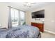 Bedroom with natural light, features a ceiling fan, and neutral paint at 327 Freeland Way, Moncks Corner, SC 29461