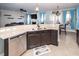 Modern kitchen features stainless steel appliances, granite countertops, and an open concept layout at 327 Freeland Way, Moncks Corner, SC 29461