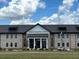 View of Foxbank Elementary School from the front lawn, featuring a brick facade at 327 Freeland Way, Moncks Corner, SC 29461
