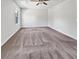 Large bedroom showcasing neutral walls, carpet floors, a ceiling fan, and a bright window; ideal for relaxation at 359 Dunlin Dr, Summerville, SC 29486