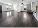 Open-concept living space featuring hardwood floors, white walls, and plenty of room for entertaining at 359 Dunlin Dr, Summerville, SC 29486