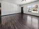 Bright living room featuring sleek hardwood floors, modern trim, and large windows allowing natural light at 359 Dunlin Dr, Summerville, SC 29486